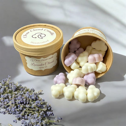 Kraft-paper-color Candle containers with cloud-shaped wax melts and lavender flowers on a light background